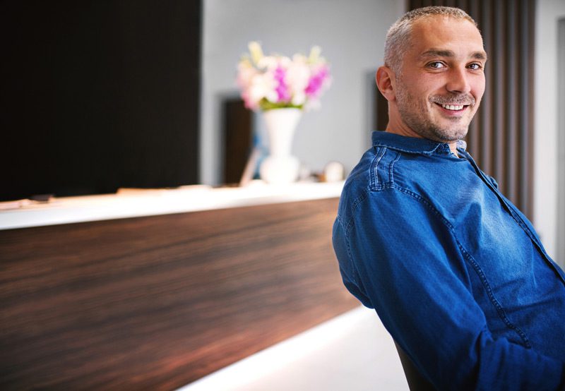 Male-patient-sitting-in-a-waiting-room-of-a-urology-clinic